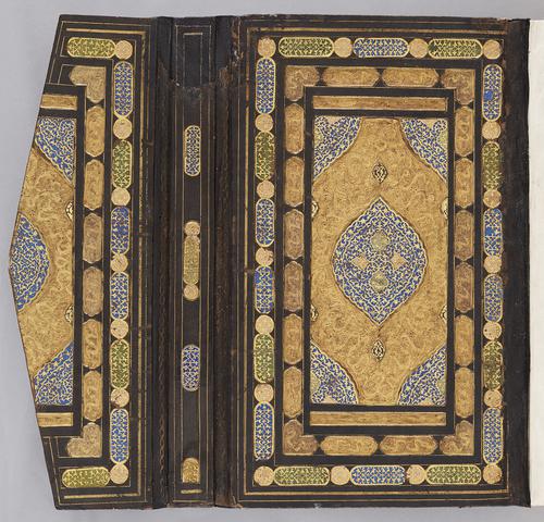  Open bookbinding laid flat, dark brown leather with gilded central panel of gold filigree medallion and cornerpieces, framed by two rows of cartouches of stamped gold cloud and floral scrolls, and gold filigree.   